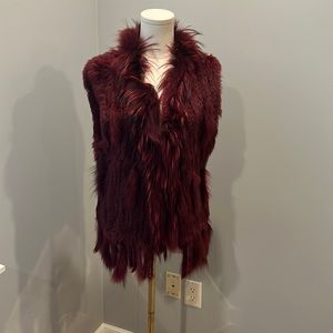Fur vest in rich merlot colour with red/black fur trim